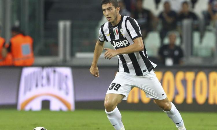 foto.calciomercato.com.marrone.juventus.azione.2012.2013.750x450.jpg