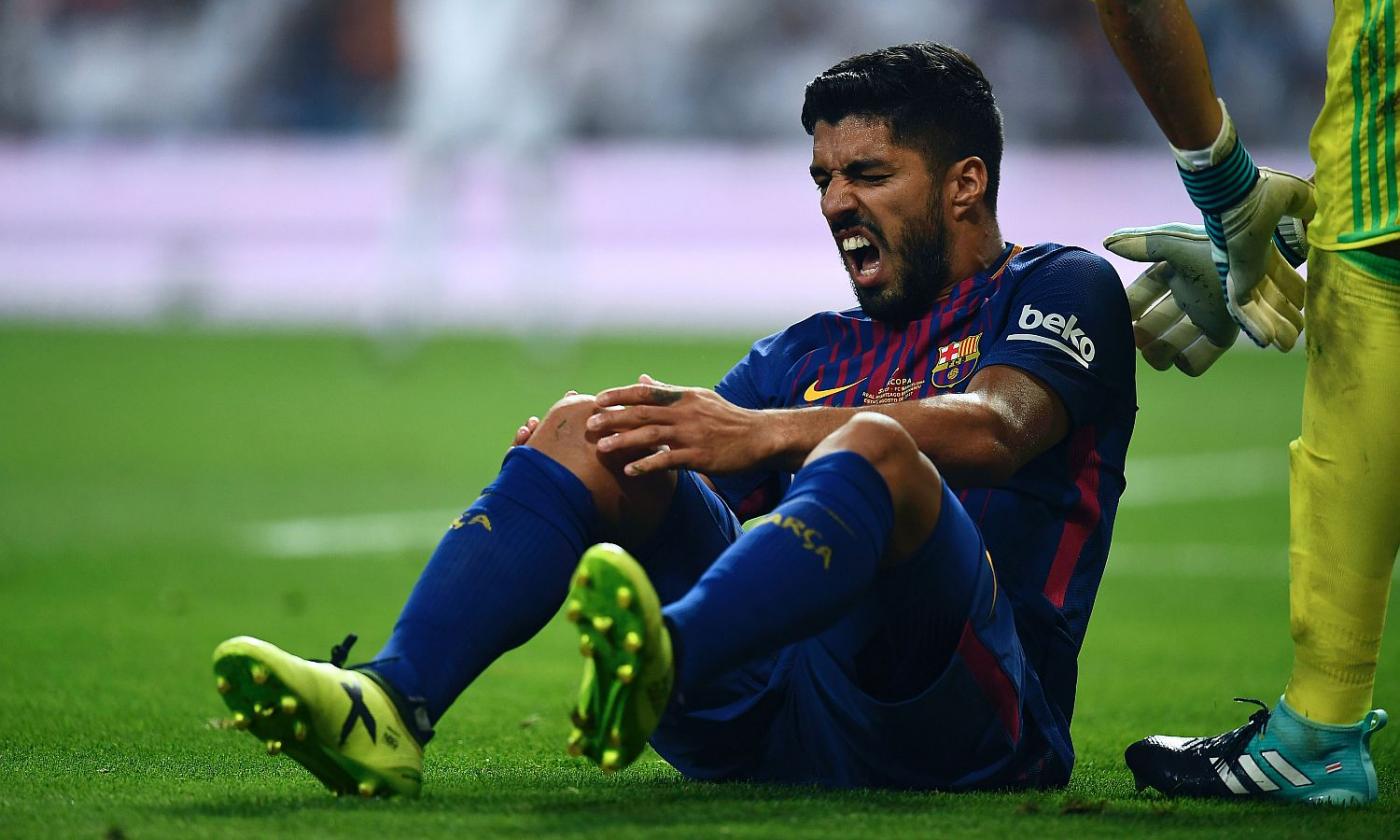 Barcelona’s Suarez out a for a month with knee injury