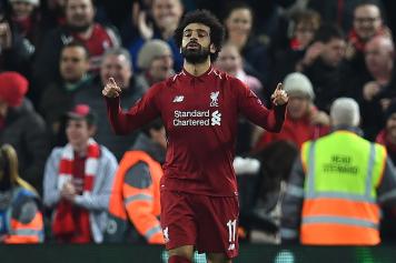 Salah esulta braccia cielo Liverpool